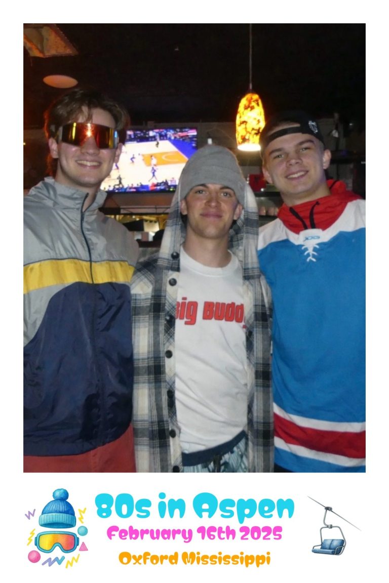 three fraternity men at a 80s in aspen ski themed mixer event, photo surrounded by a custom moments event border with a ski themed details
